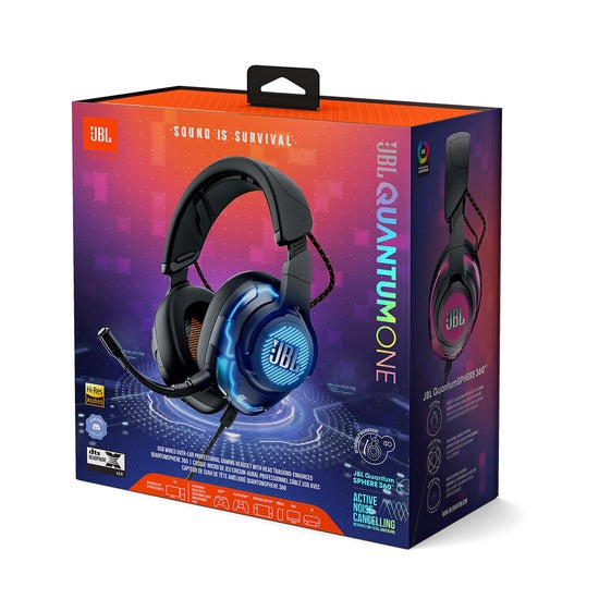 Box packaging of JBL QUANTUM ONE USB wired over-ear professional gaming headset with a detachable boom microphone, displayed against a multicolored geometric pattern background.