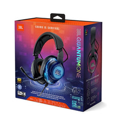 Box packaging of JBL QUANTUM ONE USB wired over-ear professional gaming headset with a detachable boom microphone, displayed against a multicolored geometric pattern background.