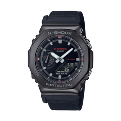 A black CASIO G-SHOCK watch with a digital display and analog hands, featuring a black band and ion-plated bezel.