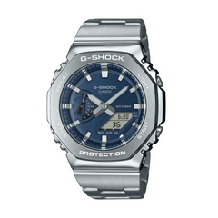A CASIO G-SHOCK GM-2110D-2BDR watch with a silver band and case, featuring a digital display and analog timekeeping.