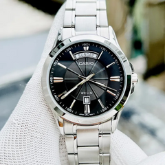 CASIO MTP-1381D Series Men’s Analog Watch – Stainless Steel, Day & Date, Roman Numerals, 50m Water Resistant, Quartz