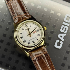 CASIO LTP-V006GL-7BUDF Women’s Analog Watch – Gold Leather Strap, White Roman Dial, Day & Date Display, Quartz Movement, Elegant Classic Design