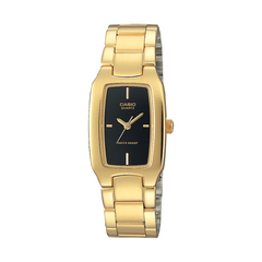 Gold Casio watch with black face on a white background