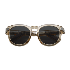 Sunglasses with a gold frame and dark lenses on a white background