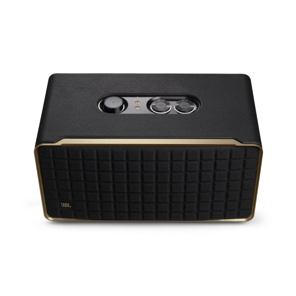 A black JBL Authentics 500 Bluetooth speaker with a premium aluminum frame and a custom leather-like enclosure. It features a visible downfiring woofer and the JBL logo at the front.