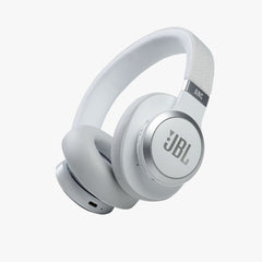 White JBL headphones on a light gray background