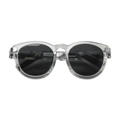 Clear frame sunglasses with black lenses on a white background