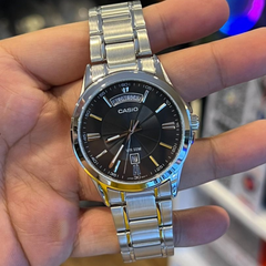 CASIO MTP-1381D Series Men’s Analog Watch – Stainless Steel, Day & Date, Roman Numerals, 50m Water Resistant, Quartz