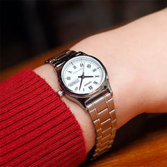CASIO LTP-V006D-7BUDF Women’s Analog Watch – Silver Stainless Steel, White Roman Dial, Day & Date Display, Quartz Movement, Elegant Classic Design