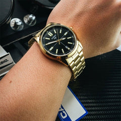 CASIO MTP-VD02G-1EUDF Standard Analog Men’s Watch – Black Dial, Gold Stainless Steel Case & Band, Date Display, Quartz Movement, 50M Water Resistance, Mineral Glass – Men’s Luxury Business Watch