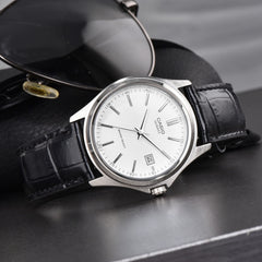 CASIO MTP-1183E Men’s Analog Watch – Leather Strap, Date Display, Ion-Plated Case & Water Resistant