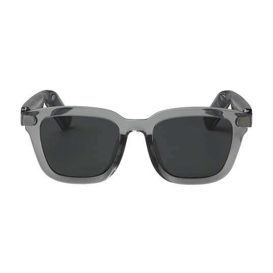 Gray sunglasses with dark lenses on a white background