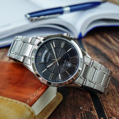 CASIO MTP-1381D Series Men’s Analog Watch – Stainless Steel, Day & Date, Roman Numerals, 50m Water Resistant, Quartz