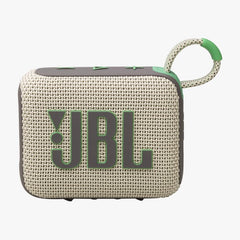 Portable JBL speaker with a beige texture and green accents on a white background