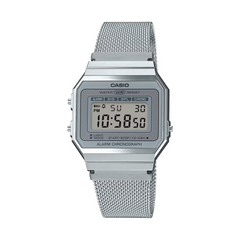 Silver Casio digital watch with mesh band on a white background