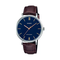 Casio watch with a blue dial and brown leather strap on a white background