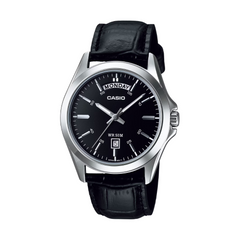 Casio watch with black leather strap and black dial on a white background