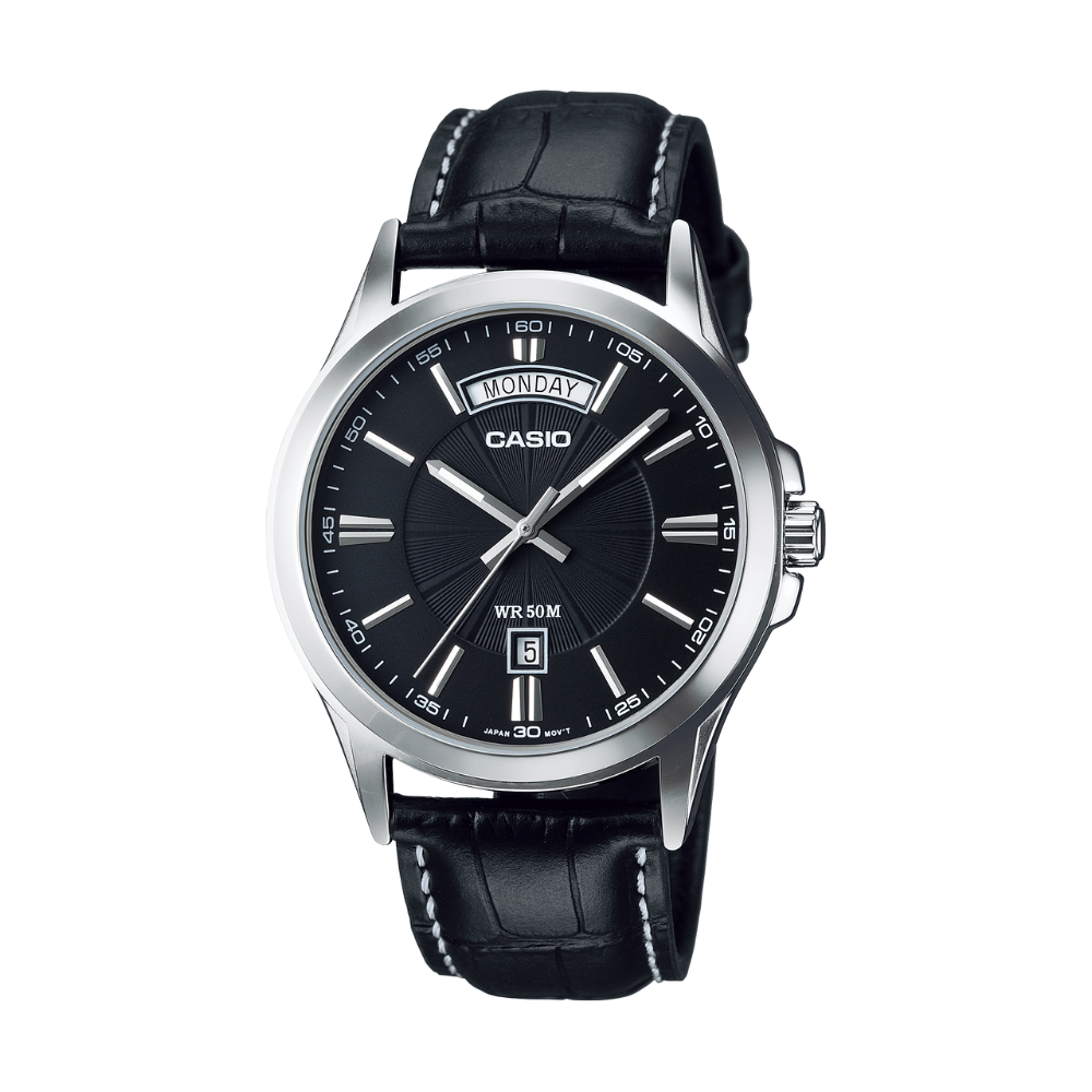 Casio watch with black leather strap and black dial on a white background