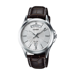 Casio watch with brown leather strap on a white background