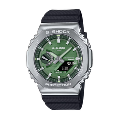 G-Shock watch with green face and black strap on a white background
