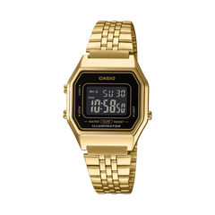 Gold Casio digital watch on a white background