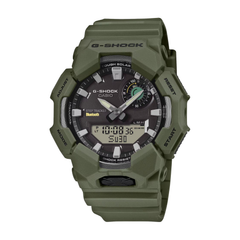 Green G-Shock watch on a white background