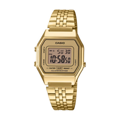 Gold Casio digital watch on a white background