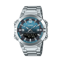 Casio watch with silver band and blue face on a white background