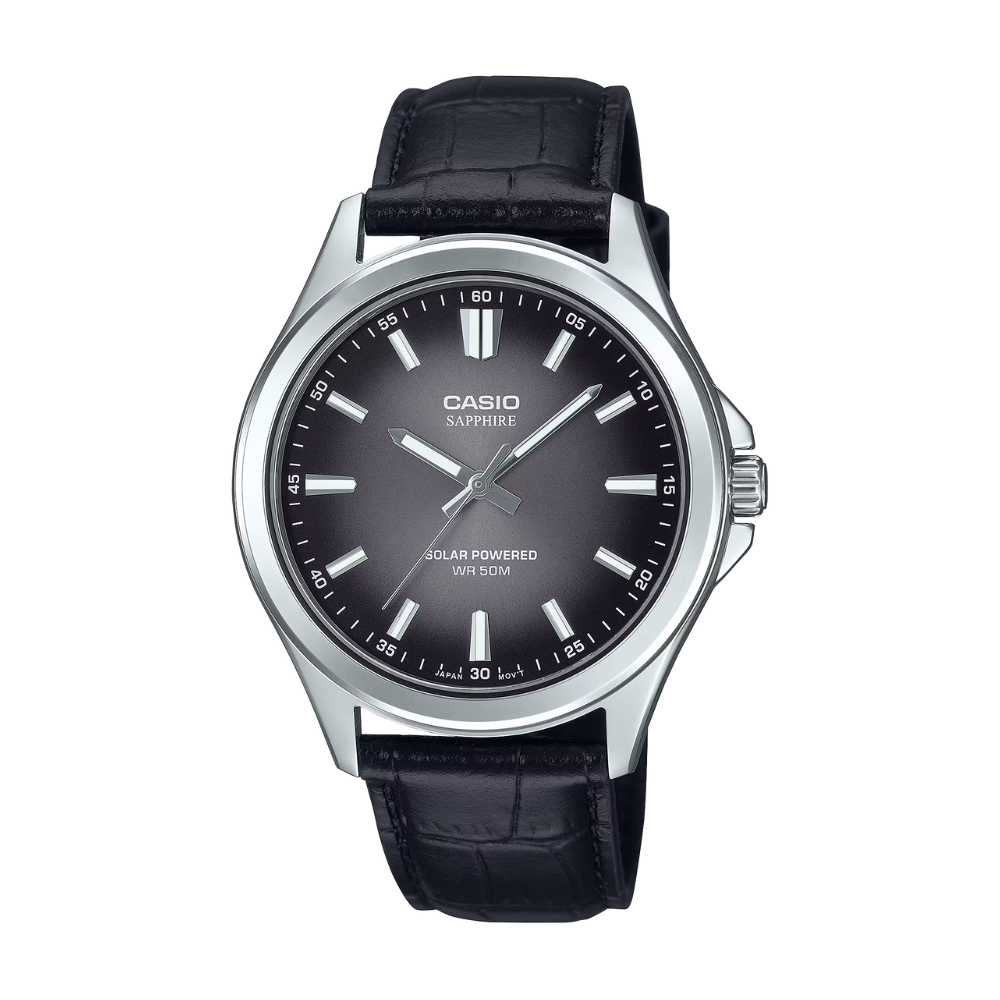 Casio watch with black leather strap and dark face on a white background