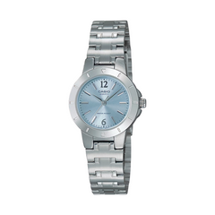 Silver Casio watch with a light blue dial on a white background