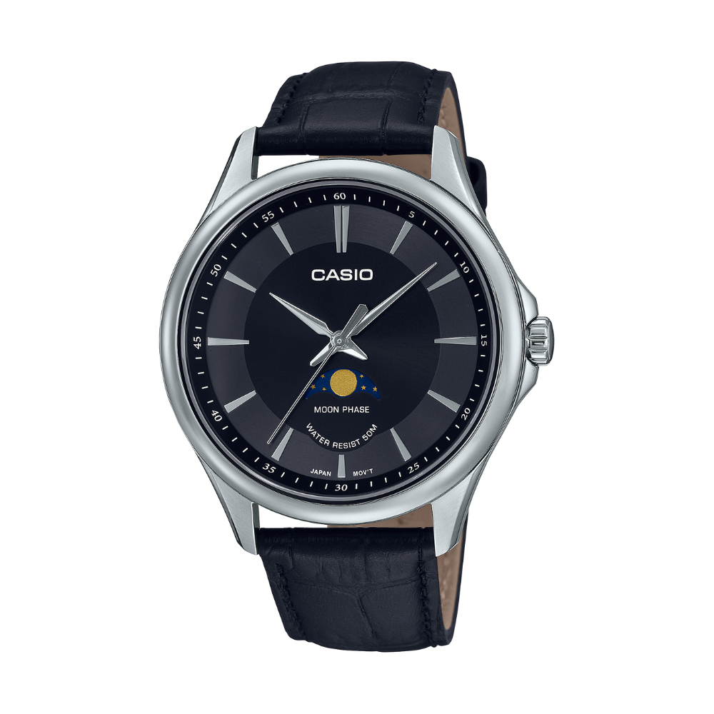 Casio watch with black leather strap and dark face on a white background