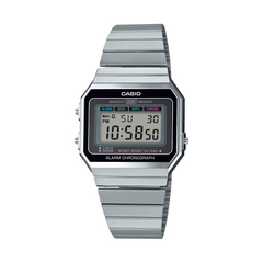 Casio digital watch with metallic band on a white background