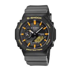 G-Shock watch with black and gray strap and yellow accents on a white background