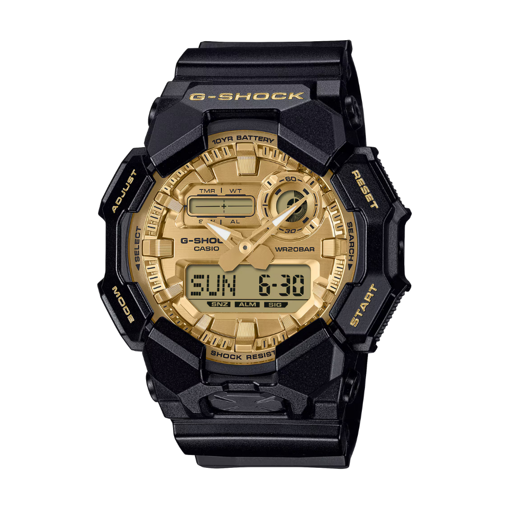Black and gold G-Shock watch on a white background