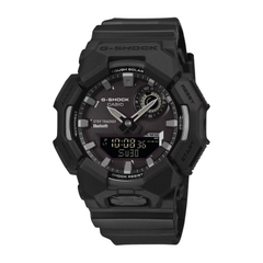 Black Casio G-Shock watch on a white background