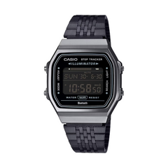Casio digital watch with black strap on a white background