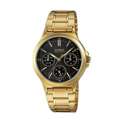 Gold Casio watch with black dial on a white background