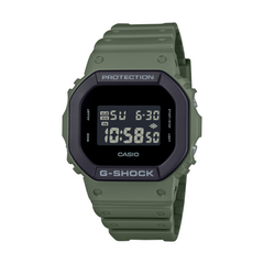 Green Casio G-Shock digital watch on a white background