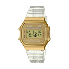 Gold Casio digital watch with a clear strap on a white background