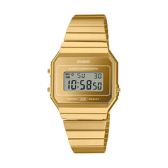 Gold Casio digital watch on a white background
