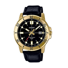 Casio watch with black face and gold casing on a white background
