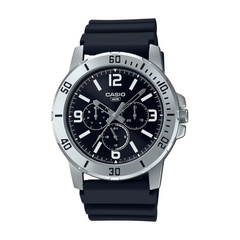 Casio watch with black strap and black dial on a white background