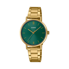 Gold Casio watch with a green face on a white background