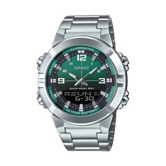 Casio watch with silver case and green dial on a white background