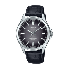 Casio watch with black leather strap and dark face on a white background
