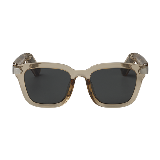 Sunglasses with a beige frame and dark lenses on a white background