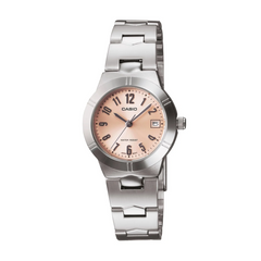 Casio watch with silver band and pinkish-beige dial on a white background