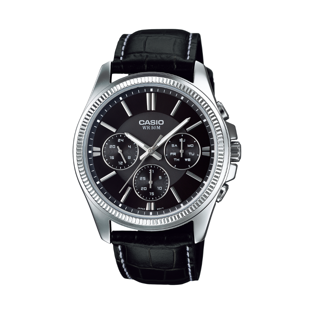 Casio watch with black leather strap and black dial on a white background