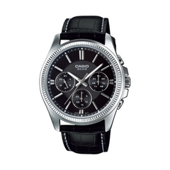 Casio watch with black leather strap and black dial on a white background