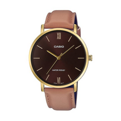 Casio watch with brown leather strap and gold casing on a white background